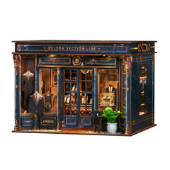 DIY mini dollhouse kit, front view dark blue storefront with open interior details and props.