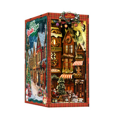DIY book nook kit box showing a lit Christmas street corner miniature scene