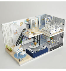 Miniature dollhouse DIY kit, white loft villa interior with lit bed, kitchen counter, and stairs