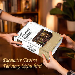 DIY mini house kit box held in hands with corner tavern model shown on packaging
