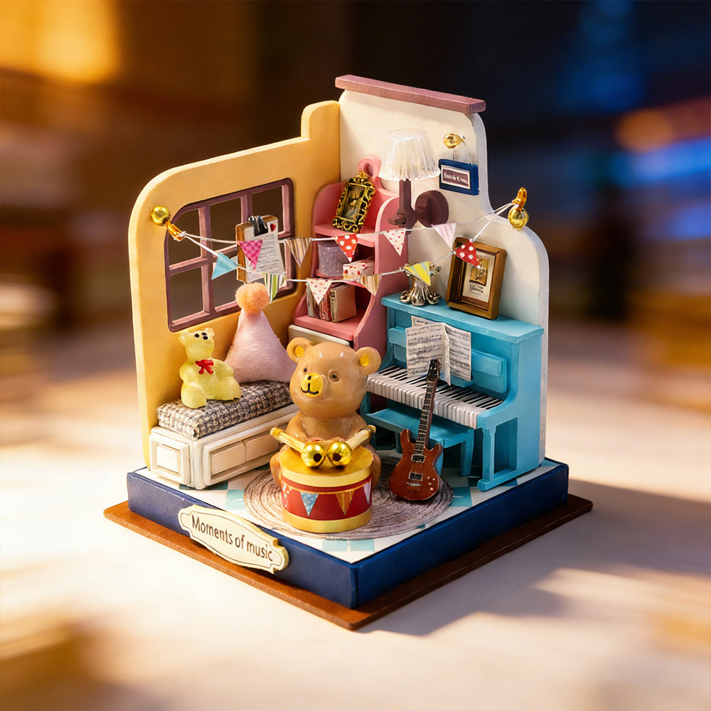 Miniature music room craft kit with teddy bear and piano, open-front display