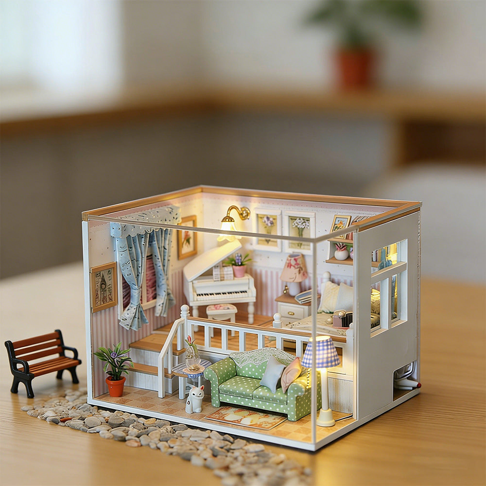Miniature dollhouse room kit with green sofa, white piano, curtains and warm lamp light