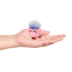 Kirby ice nano building blocks figure held in two hands, pink and clear blue