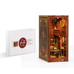 DIY book nook kit box set with labeled panel and side opening view of a lit interior