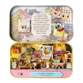 Miniature Lucky Market tiny shop display with open front, colorful stalls and figurines inside.