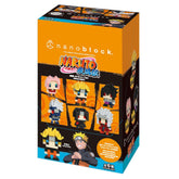 The image is a box containing a set of miniature figurines, likely representing characters from the popular animated series "Naruto". The figurines are arranged in a grid-like pattern, with each one depicting a different character from the series. The box is predominantly orange and black in color, with the characters' faces and outfits clearly visible. The text on the box indicates that these are "NANOBLOCK" figurines, and that they are "Actual Size" and "
