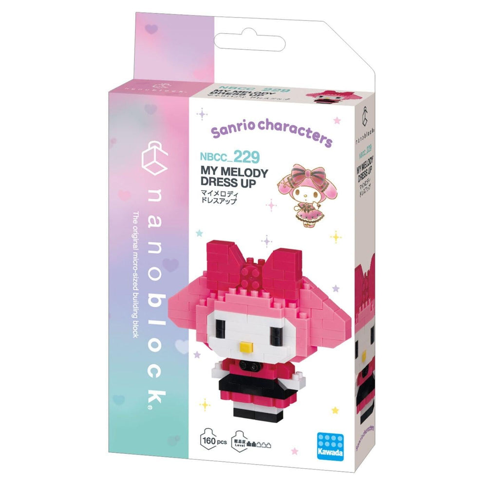 a pink Hello Kitty doll dressed up in a pink dress, with the packaging for the Hello Kitty dress-up set.