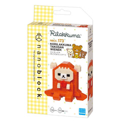 a box containing a toy called the "Korilakuma" which is a type of building block. The box is yellow and white in color, and it has a picture of the toy on it.