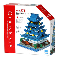The image is a box containing a set of building blocks designed to resemble the Osaka Castle in Japan. The box is predominantly red and white, with the product name and model name prominently displayed.