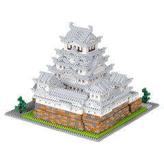 A 3D model of a Japanese castle-like structure made of small, colorful building blocks.