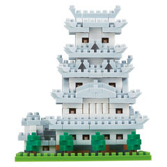 A multi-level building made of small white and gray blocks, resembling a traditional Chinese pagoda or pagoda-style structure.