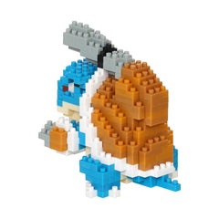 A colorful, pixelated toy resembling a turtle or turtle-like character, composed of numerous small blocks in various colors.