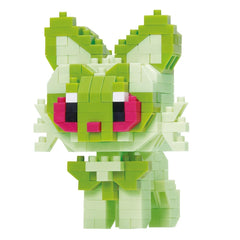A green and pink pixelated character made up of small blocks, resembling a pixelated character or a pixel art design.