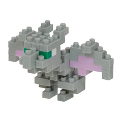 A gray LEGO brick figure with green eyes and pink wings.