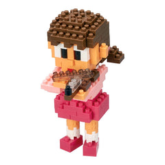 A toy figure of a girl made from building blocks, wearing a pink dress and holding a toy gun.