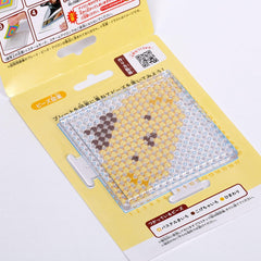 a product packaging for a product with a clear plastic sheet featuring a honeycomb pattern. The packaging has Japanese text and a QR code, indicating that it is a product designed for use in a Japanese setting.