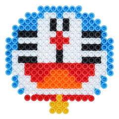 A pixelated image depicting a colorful character composed of small blue, white, red, and yellow beads.