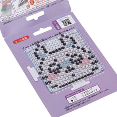 a purple package with a picture of a patterned tile or mosaic design, along with some text and numbers.