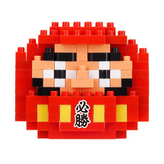 A red and yellow pixelated character made up of numerous small red and yellow blocks, resembling a pixelated face or character.
