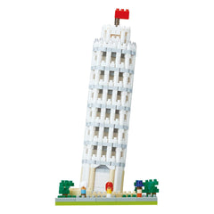A white Lego tower with a red flag on top, surrounded by green trees and small figures.