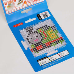 a blue plastic packaging with instructions and a pattern for a bead mosaic kit.