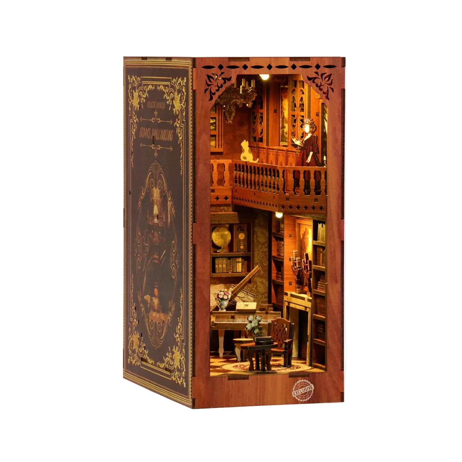 Lit miniature book nook kit with balcony railings, tiny table, chairs, and shelves