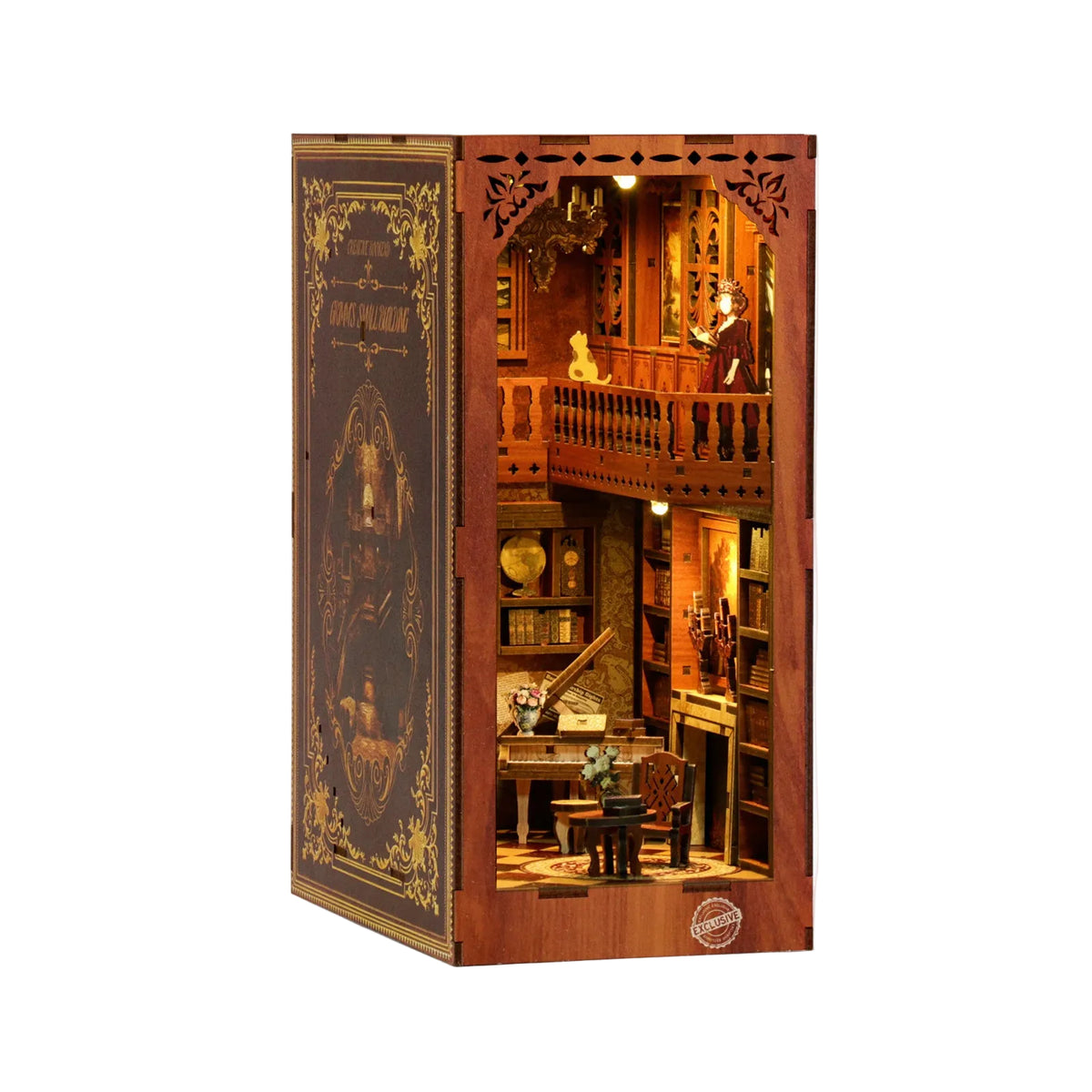 Lit miniature book nook kit with balcony railings, tiny table, chairs, and shelves