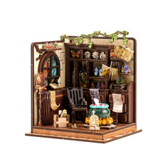 DIY miniature house kit showing open-front room with shelves, window, fireplace, and furniture