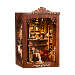 Wooden DIY mini library scene with illuminated shelves, desk, chair, and fireplace details