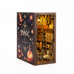DIY book nook kit box with illustrated dark wizard-themed scene and bottle detail