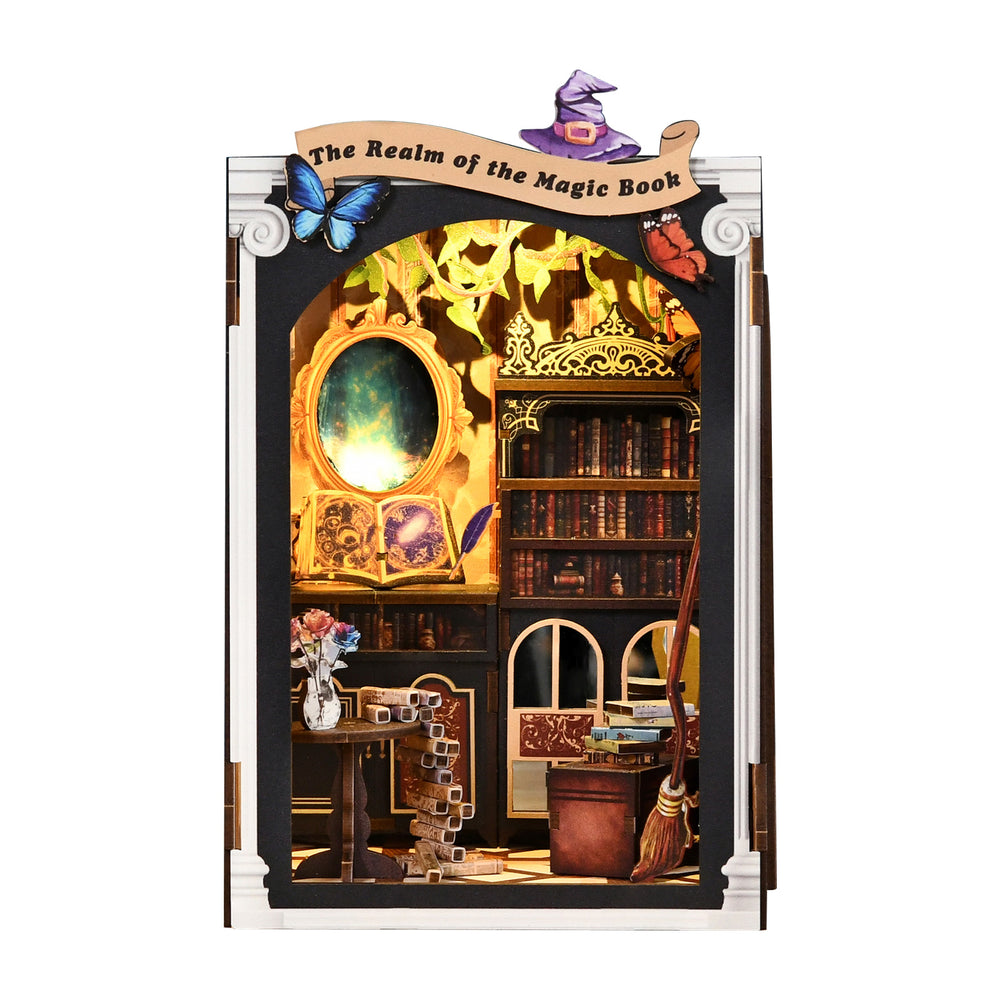DIY miniature book nook kit with open front showing shelves and arched doorway