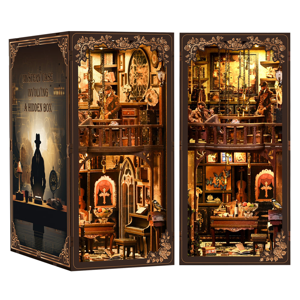 DIY book nook display case showing glowing miniature room with detailed shelves and arches