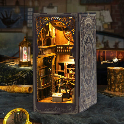 A miniature, intricately designed wooden dollhouse with a detailed interior, illuminated by warm lighting, sits on a table surrounded by various objects.