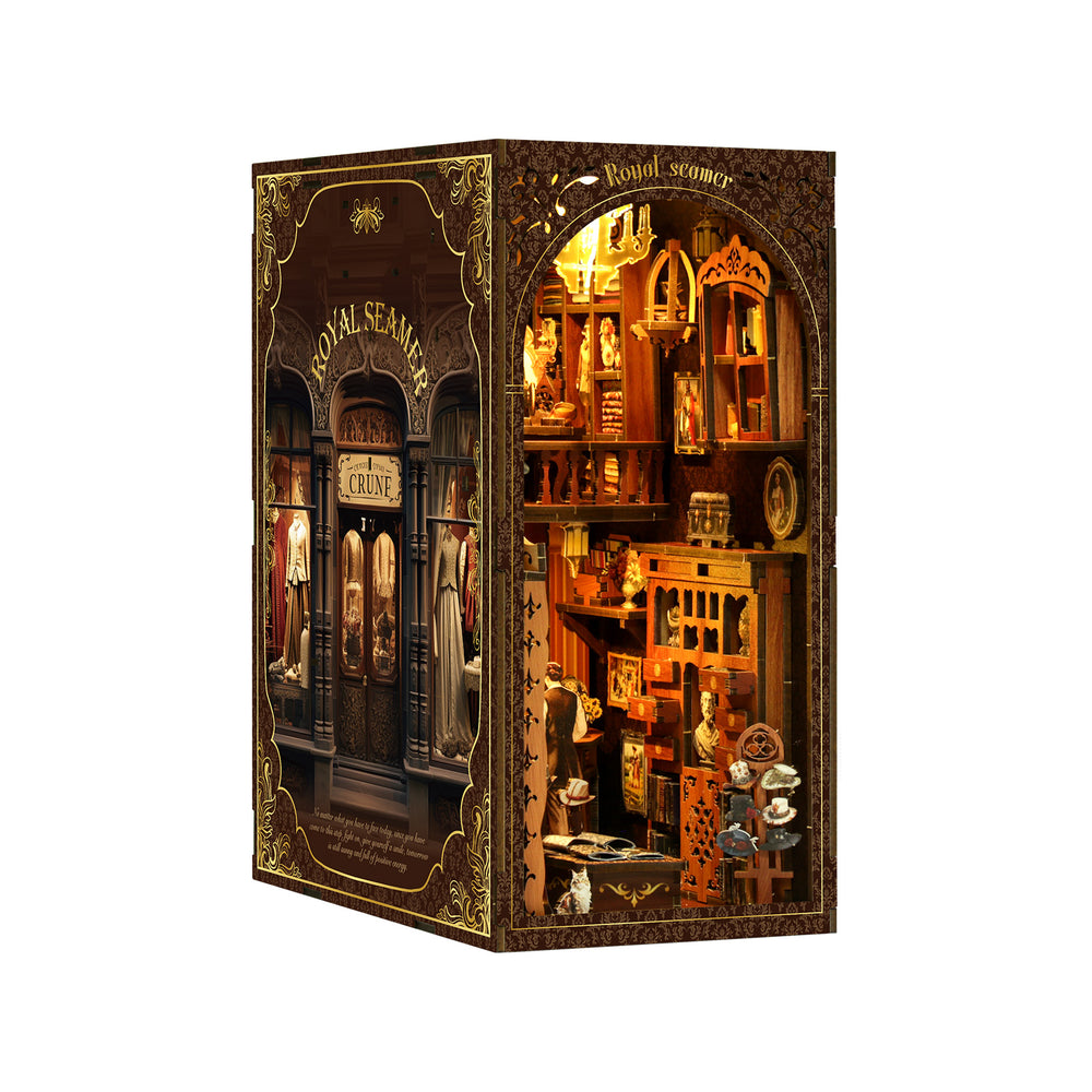 DIY book nook kit with lit dollhouse interior and detailed wall alcoves