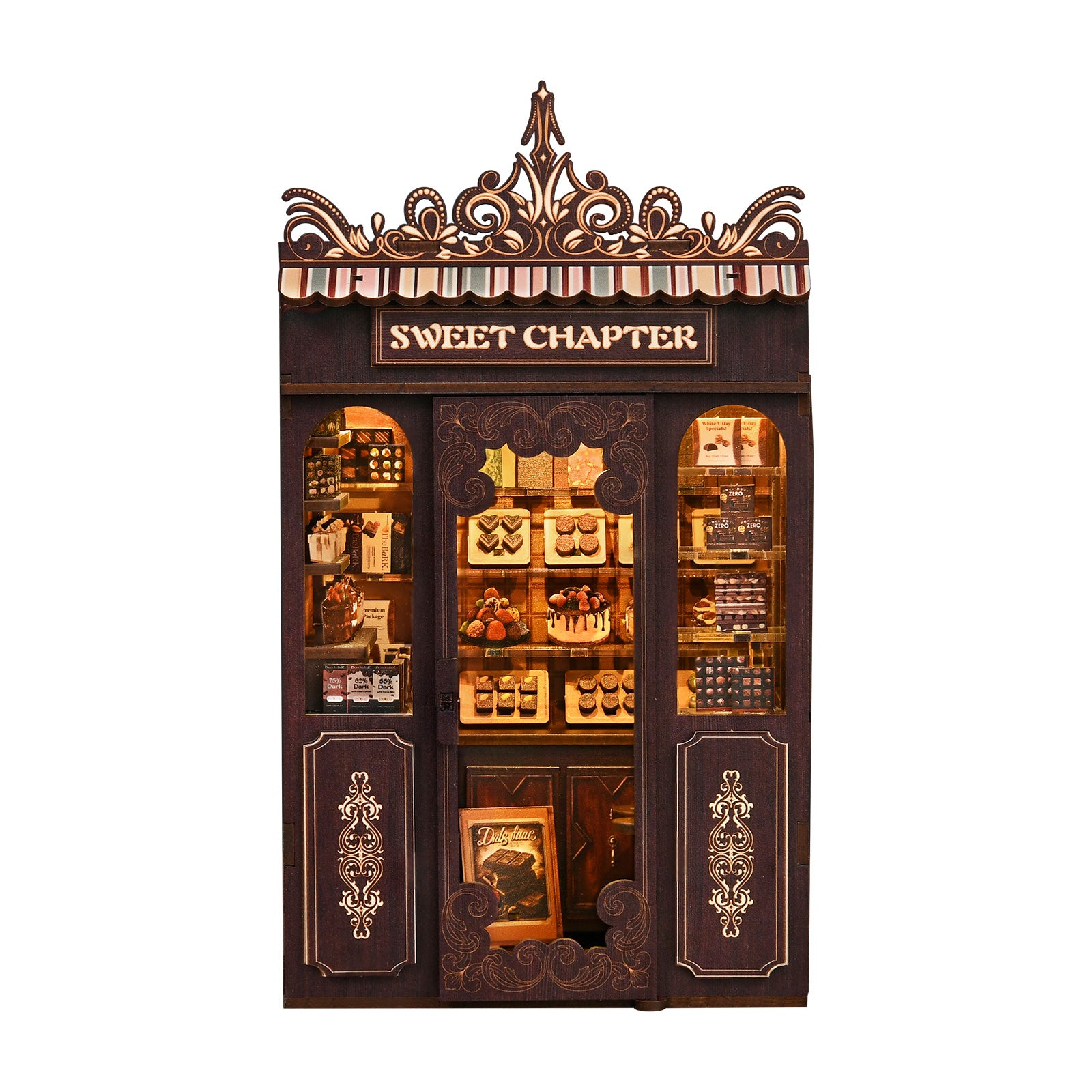 Mini shop dollhouse kit, front view with ornate canopy and lit display counters