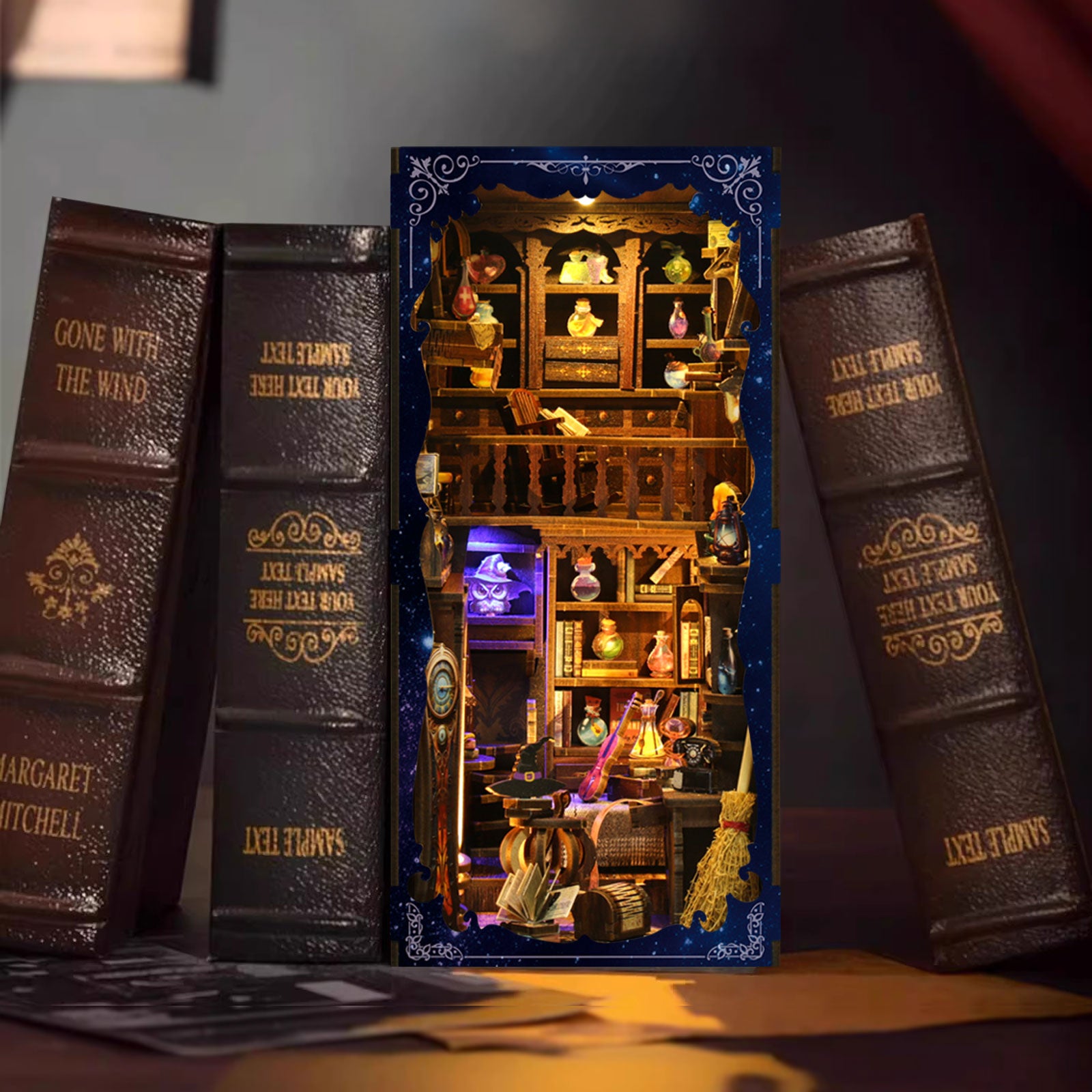 A miniature diorama of a bookshelf with various books and decorative items, including a teapot, vases, and other knick-knacks, is displayed between two large hardcover books.