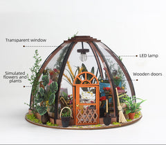 Mini greenhouse miniature house kit with transparent panels, wooden doors, and LED lamp.