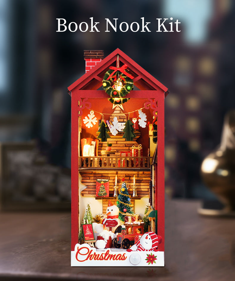 Red miniature Christmas book nook shelf insert with wreath, candles, and snowman figurine