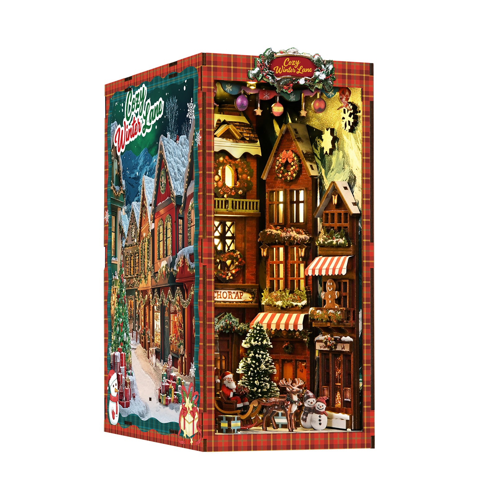 DIY book nook kit box showing a lit Christmas street corner miniature scene
