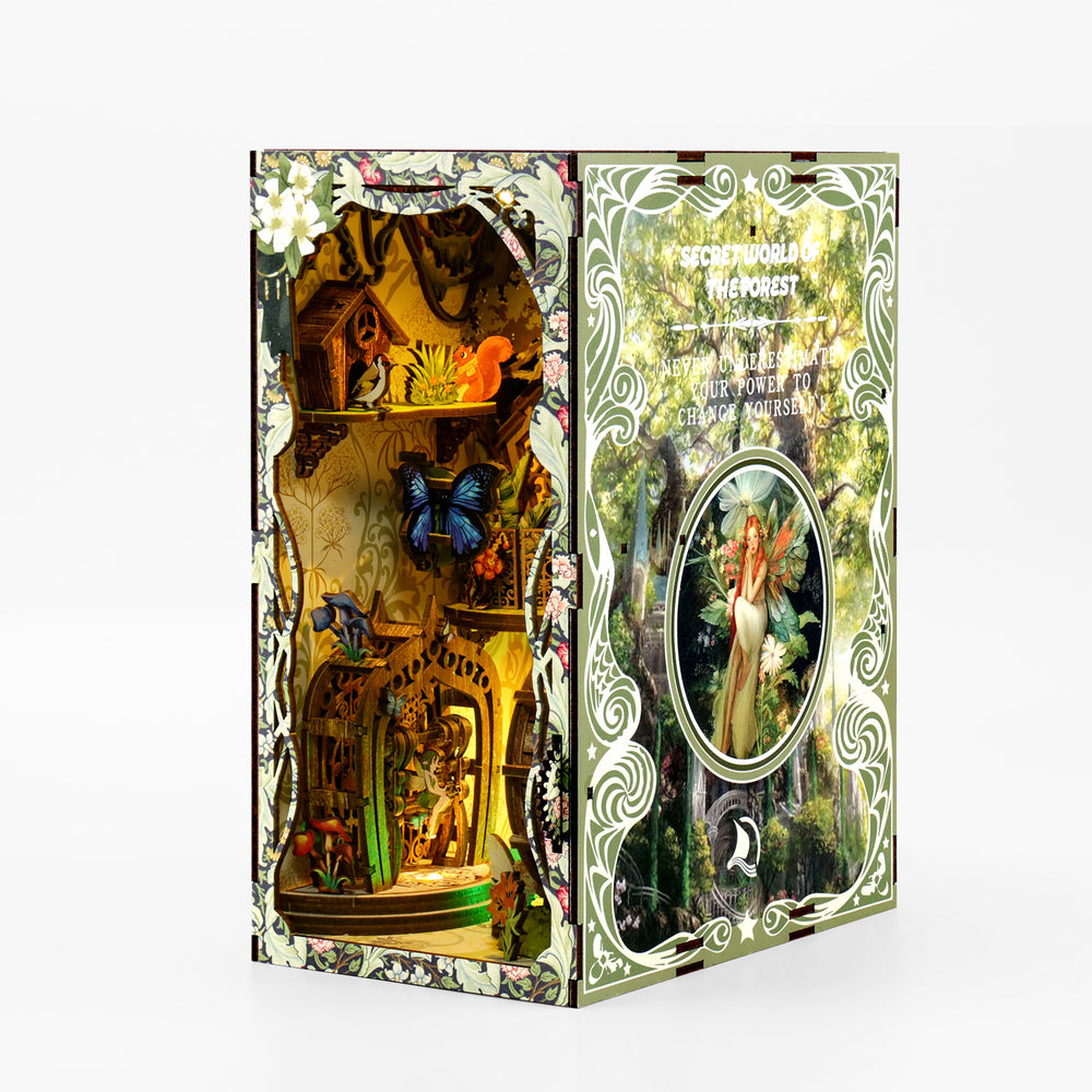 DIY book nook kit box with side view showing forest window artwork and accessory details