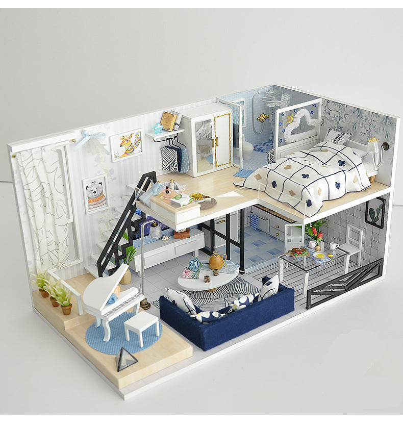 Miniature dollhouse DIY kit, white loft villa interior with lit bed, kitchen counter, and stairs