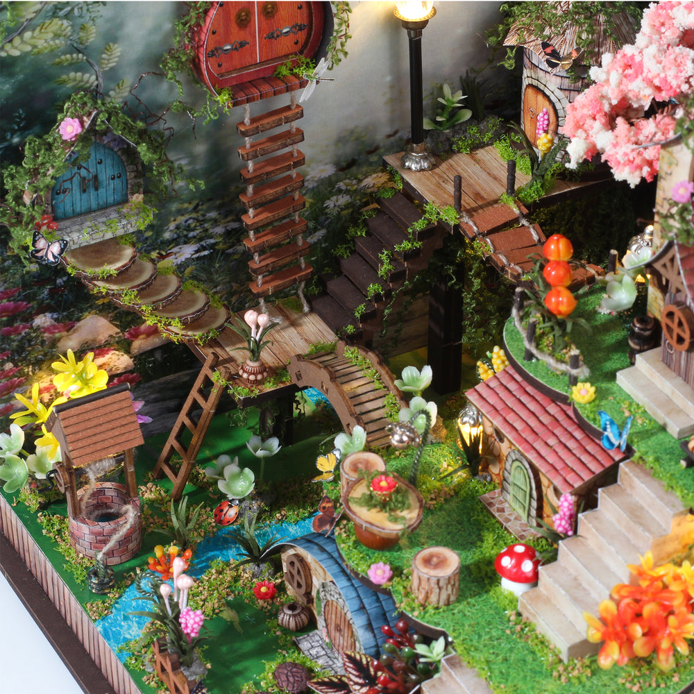 Miniature forest cabin diorama side view with stairs, stream, and blooming plants