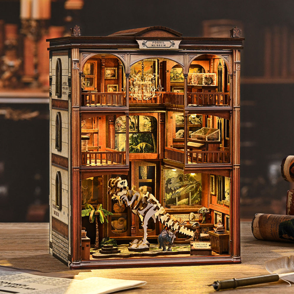 DIY miniature kit building with open-window rooms and dinosaur skeleton model display