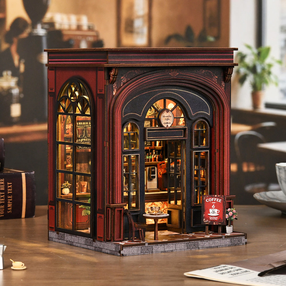 DIY book nook coffee shop miniature with tall windows and glowing arched entrance