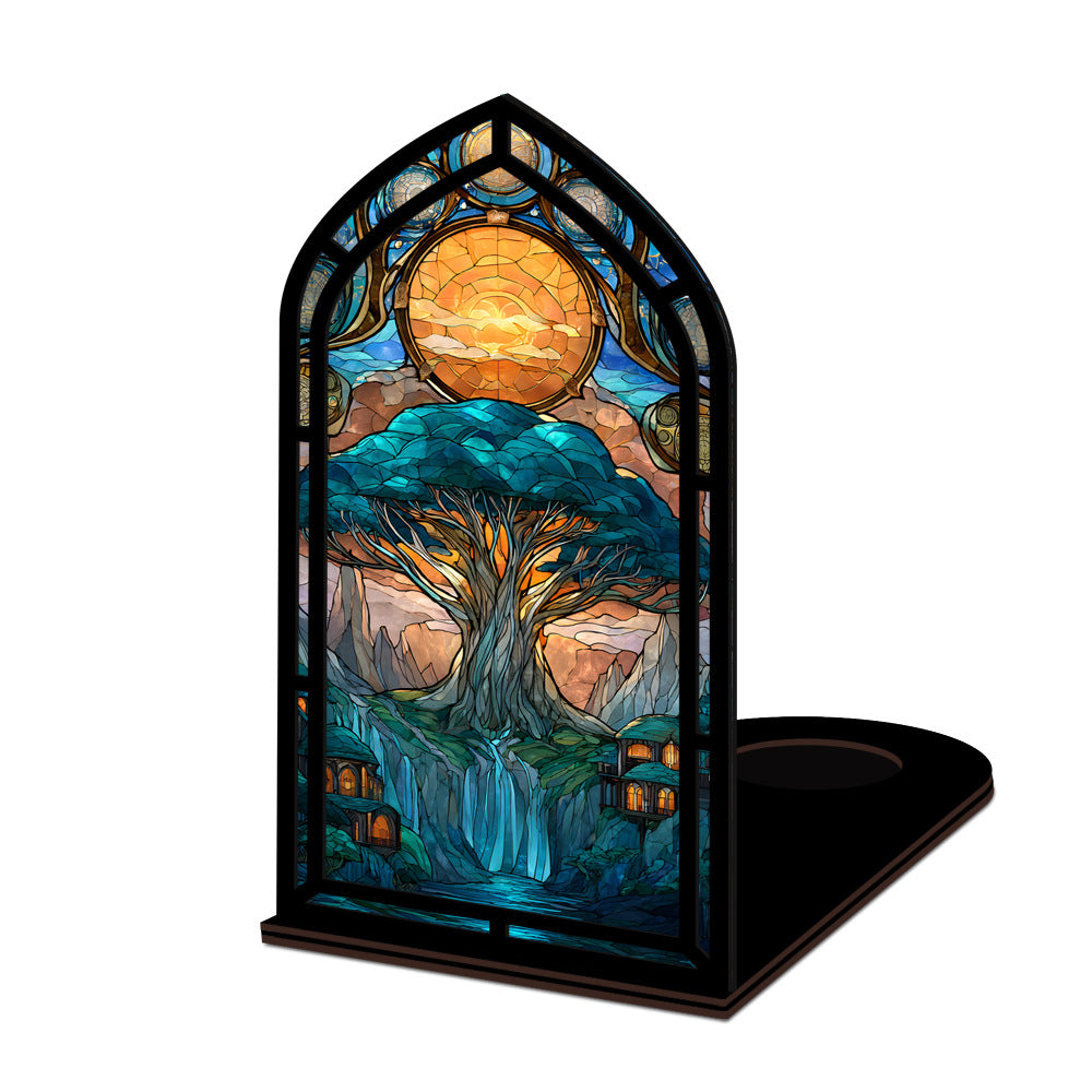 Tree-of-life book nook display with arched stained-glass tree panel and black base