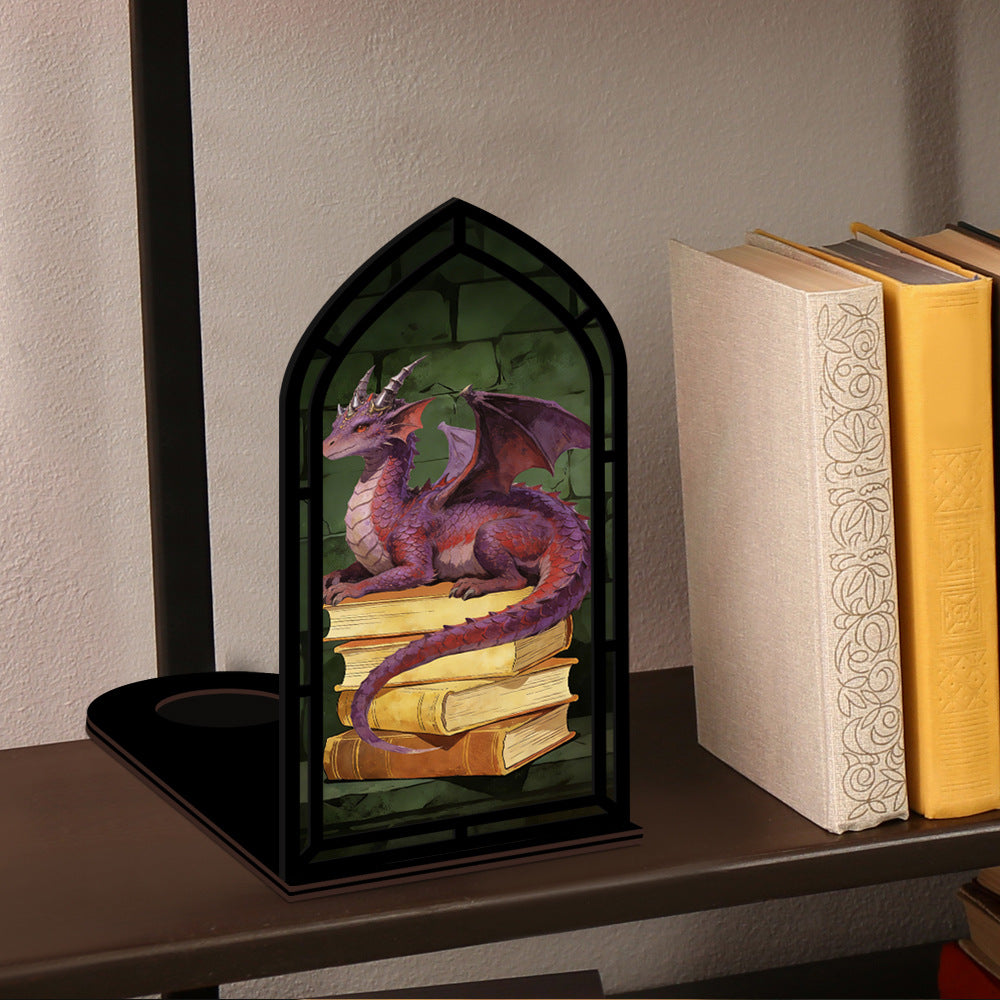 Arched dragon book nook with black frame; purple dragon on stacked books