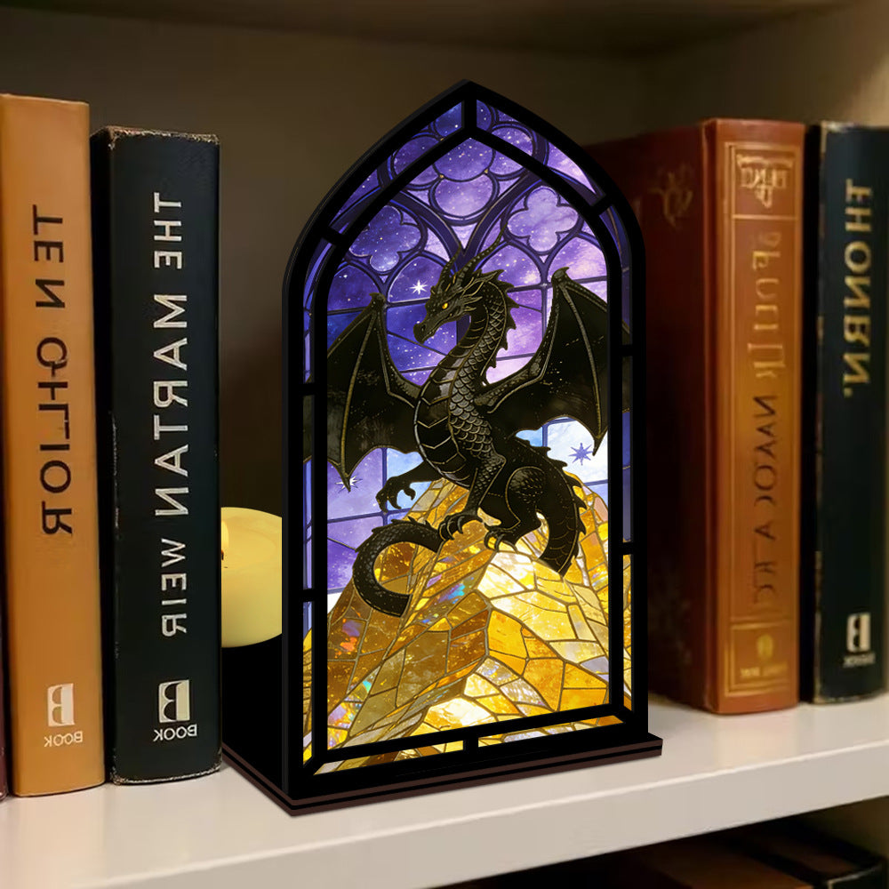 Arch-framed dragon stained-glass book nook with warm candle-like light at base
