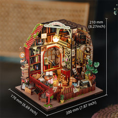 Miniature dollhouse kit with red stairway roof, book shelves, and potted plants on display base