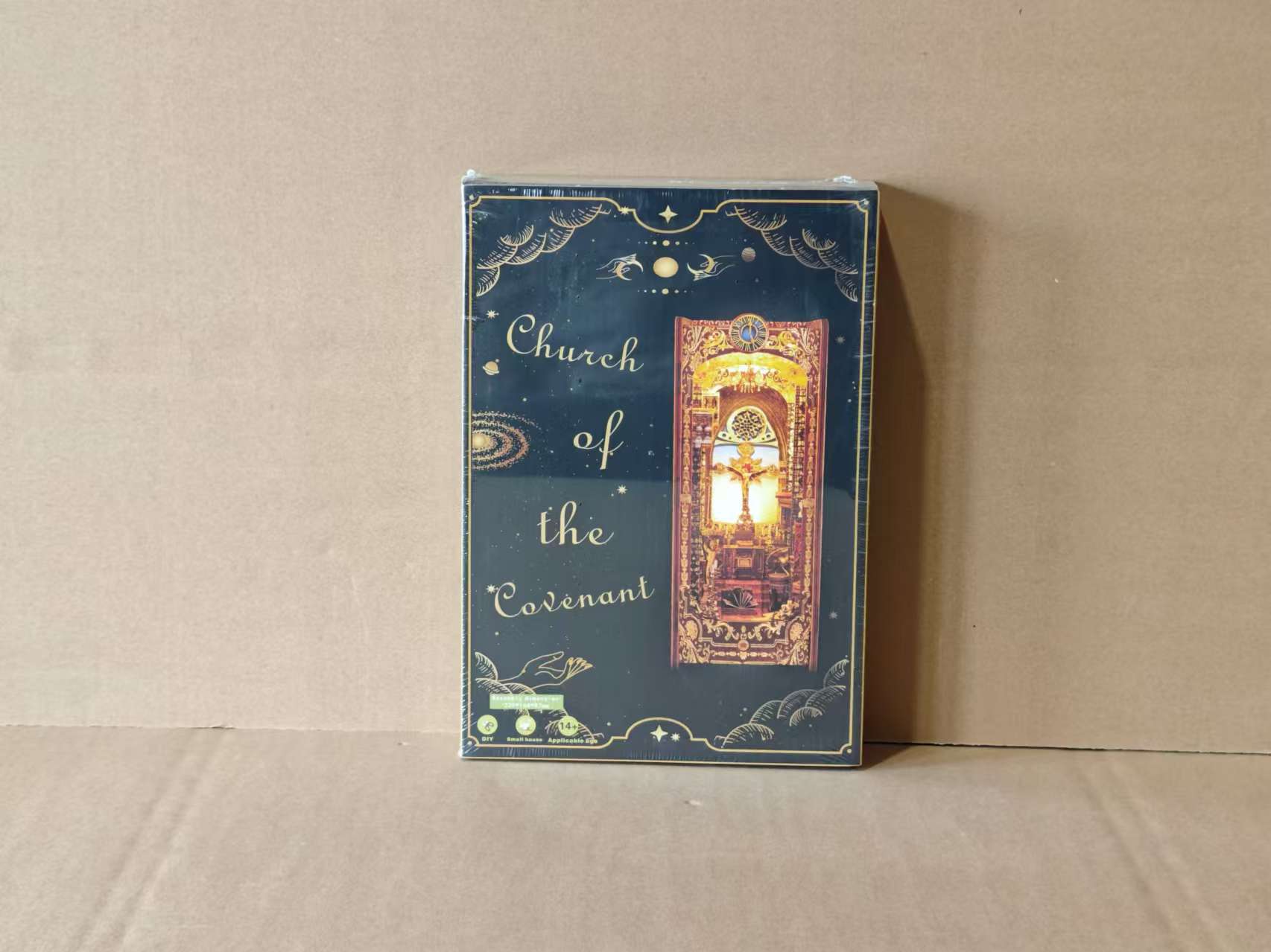 Book nook kit package reading 'Church of the Covenant' with miniature church illustration
