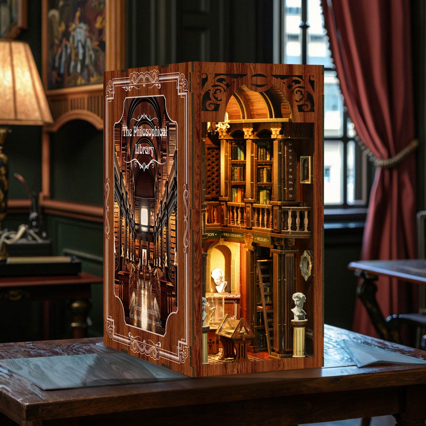 A miniature model of a library, featuring intricate details and a cozy atmosphere, displayed on a wooden table.